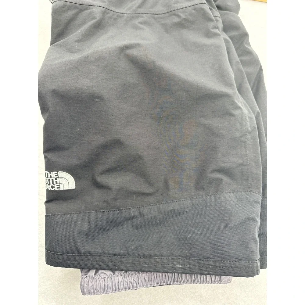 The North Face small rips